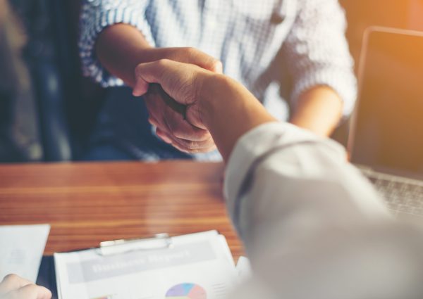 Business People Handshake Greeting Deal at work. Business People Handshake Greeting Deal at work.